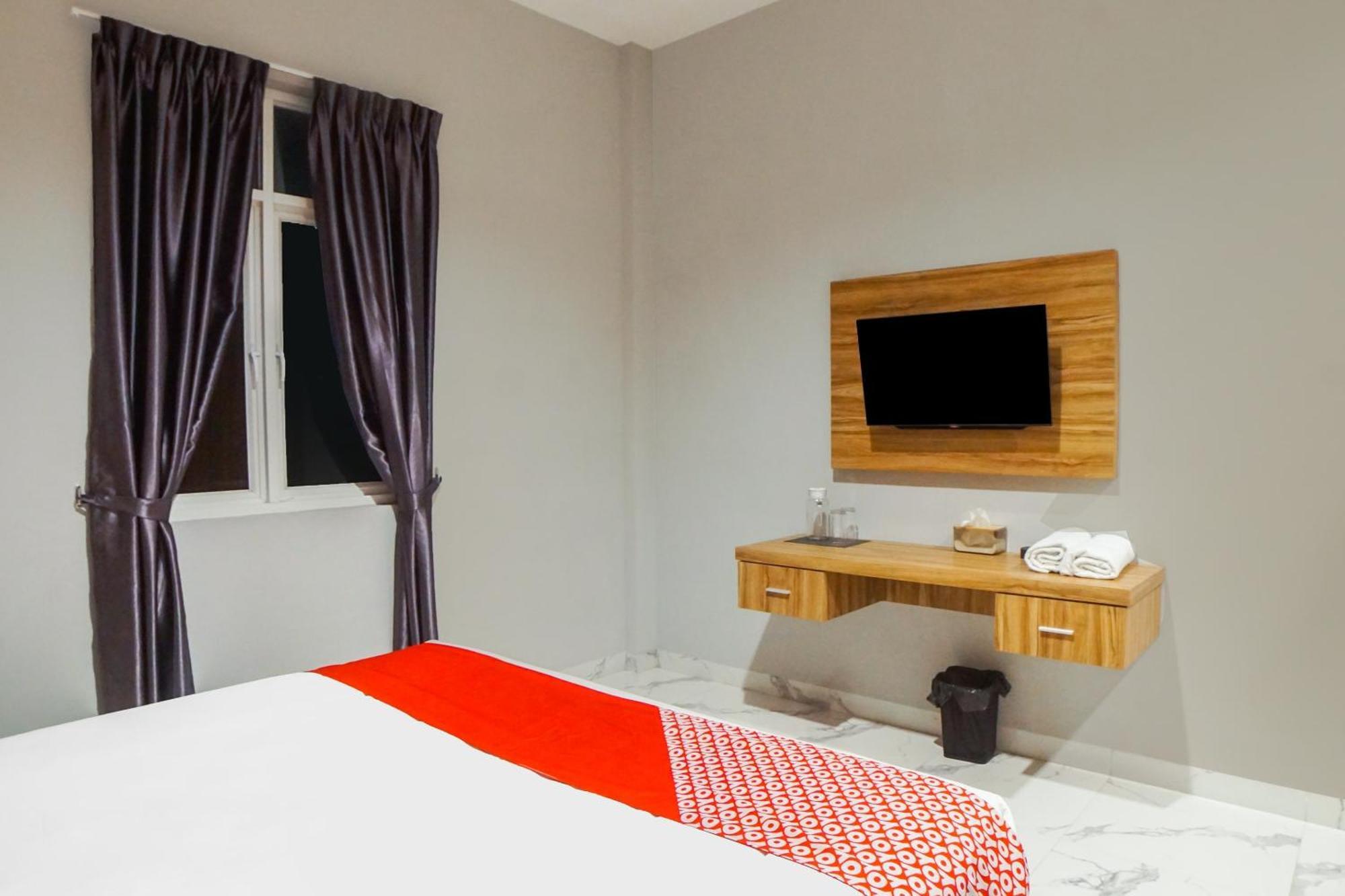 Super Oyo Capital O 92066 Papakoel Hotel & Cafe เมดาน ภายนอก รูปภาพ